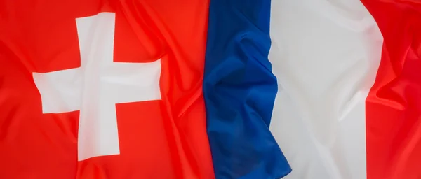 Schweiz och Frankrike flagga . — Stockfoto