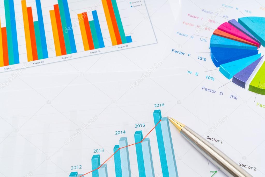 Financial charts with pen .