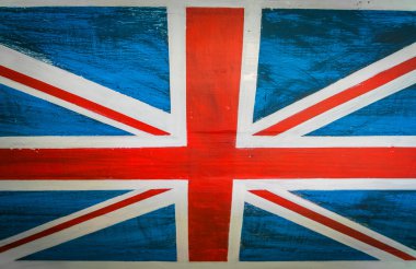 Yaşlı ahşap duvara boyalı İngiltere bayrağı .