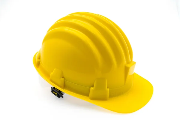 Casco de construcción de plástico duro amarillo sobre fondo blanco  . — Foto de Stock