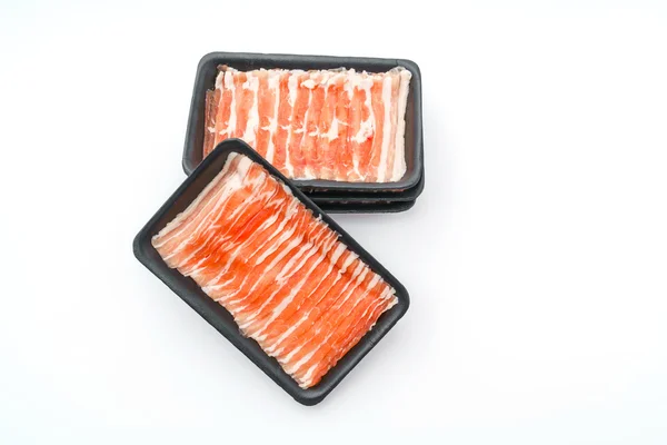 Slide of  raw pork  on white background . — Stock Photo, Image