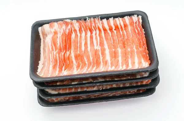 Corrediça de carne de porco crua no fundo branco  . — Fotografia de Stock