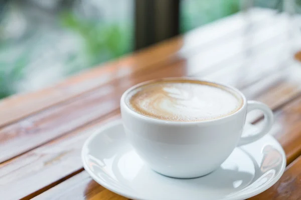 Latte Coffee konst på träbordet — Stockfoto