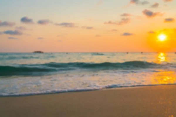 抽象模糊在日落沙滩上的脚遍 Se 的日落 — 图库照片