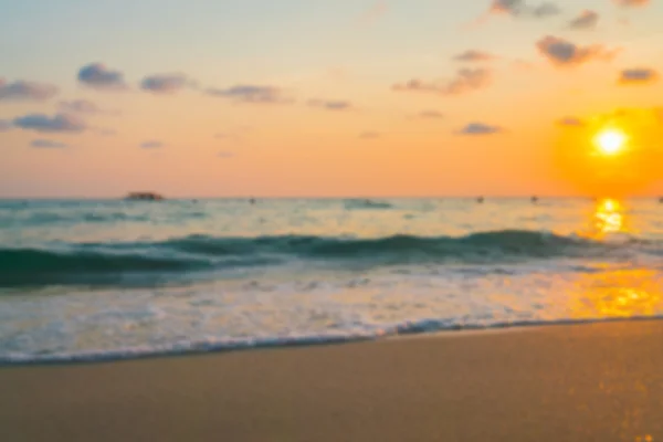 Abstract blur Feet on the sand in sunset time Sunset over the Se — Stock Photo, Image