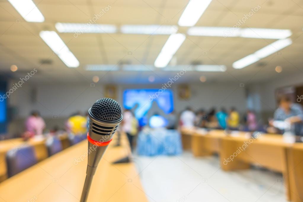 Black microphone in conference room .  ( Filtered image processe
