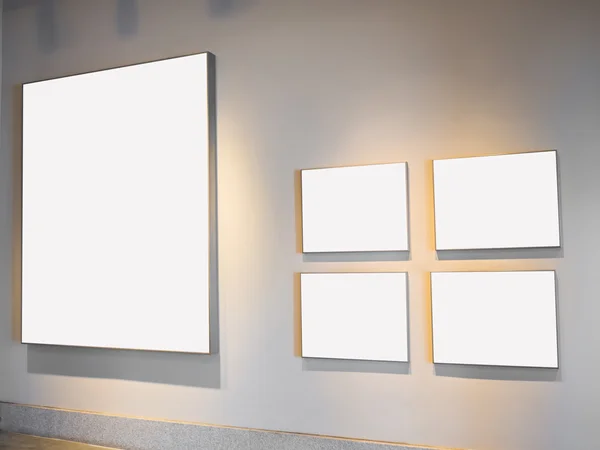 Blank picture frame on wall .