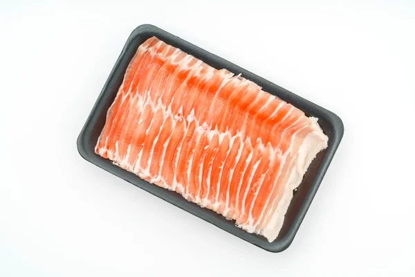 Slide of  raw pork  on white background . — Stock Photo, Image