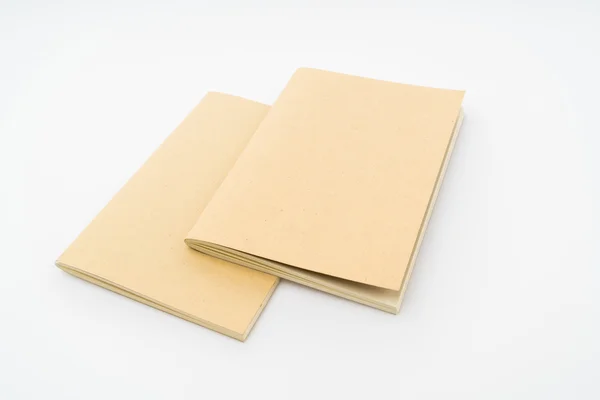 Buch aus recyceltem Papier auf weißem Hintergrund . — Stockfoto