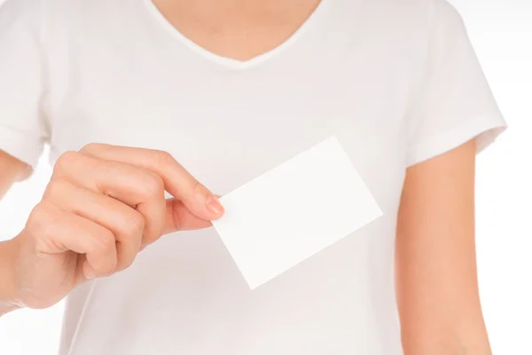 Donna mano in possesso di carta bianca biglietto da visita isolato su bianco b — Foto Stock