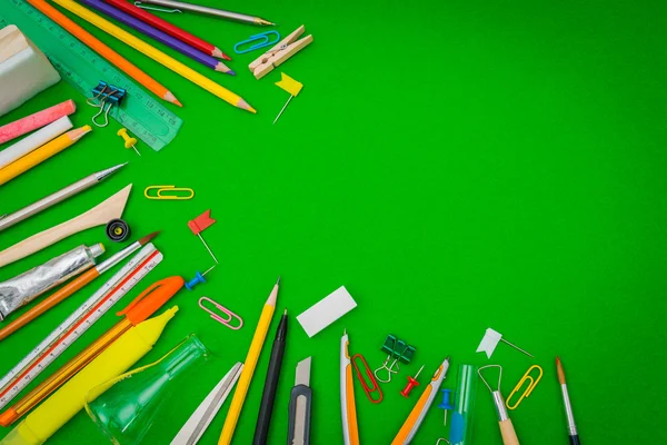 School supplies on Green chalkboard " Back to school background — Stock Photo, Image