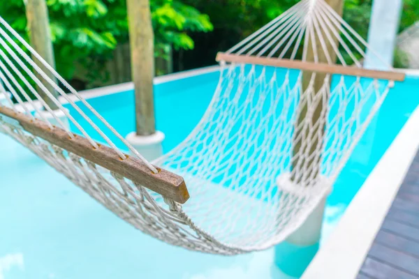 White hammocks in Luxury swimming pool . — Stock Photo, Image
