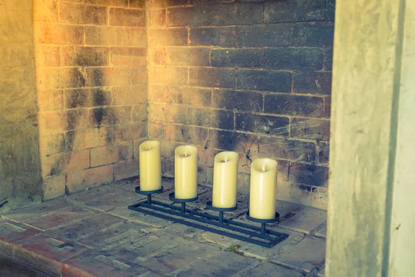 Fireplace with decorative candles .  ( Filtered image processed