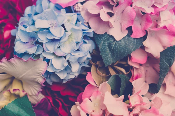 Beautiful Artificial flowers .vintage pastel tones . — Stock Photo, Image