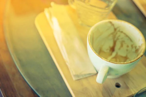 Empty cup of coffee on wooden table ( Filtered image processed v — Stock Photo, Image