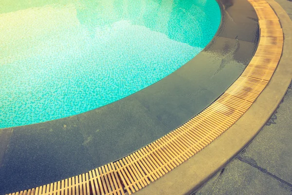 Blue swimming pool rippled water . ( Filtered image processed vi — Stock Photo, Image