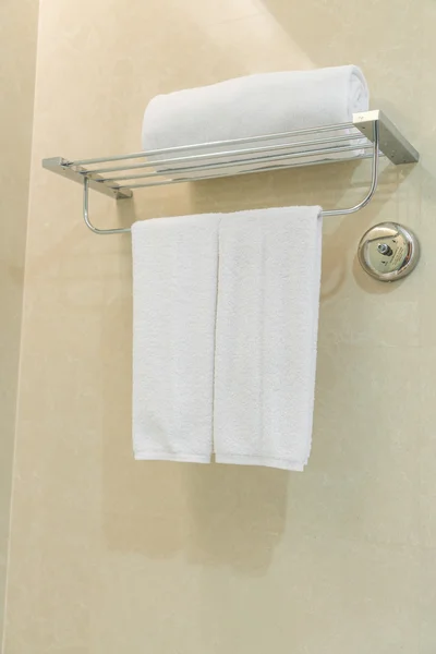 Clean white towel on a hanger prepared in bathroom . — Stock Photo, Image