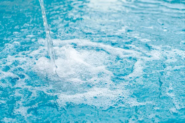 Blue swimming pool rippled water . — Stock Photo, Image