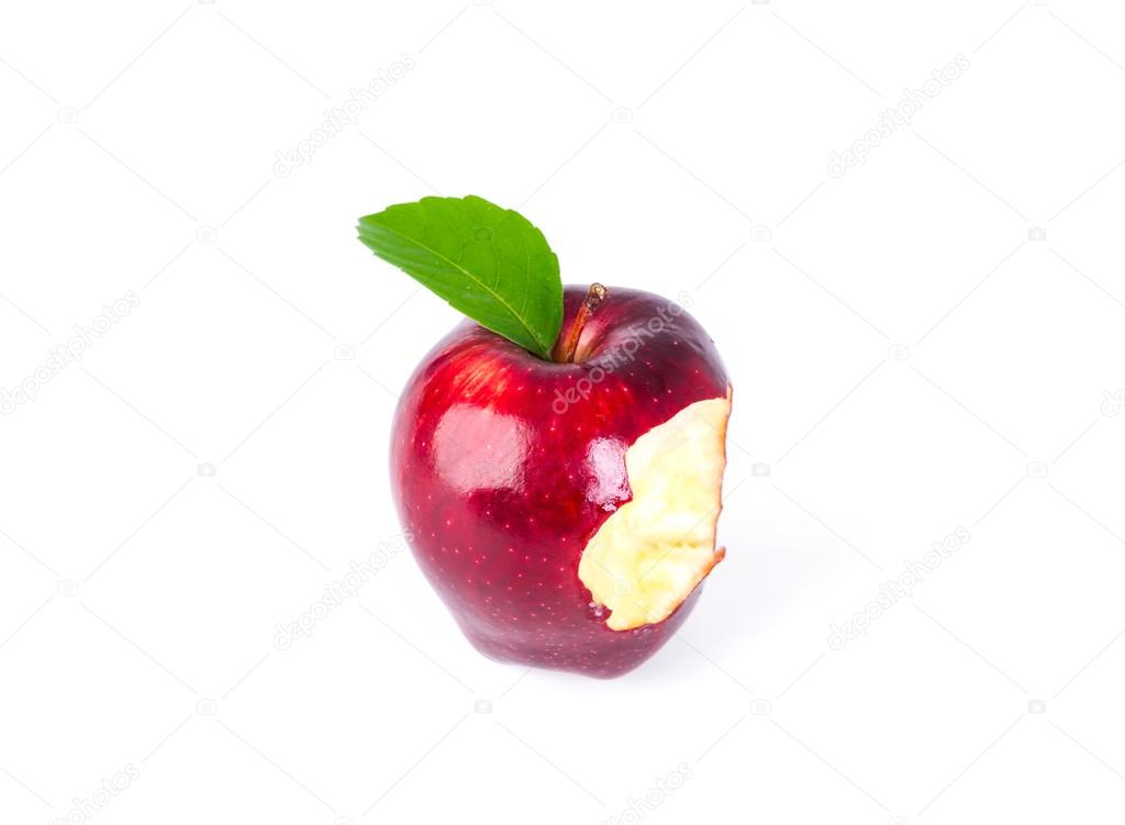 Red apple with green leaf and missing a bite .