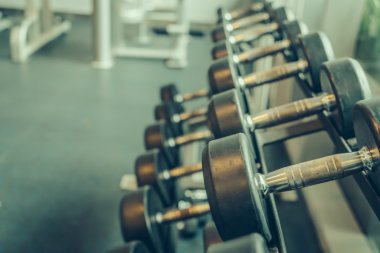 Spor halterleri ( Filtrelenmiş görüntü işlenmiş vintage efekti. ) .
