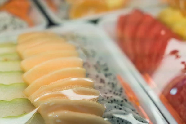 Fresh sliced on Glass tray in a restaurant . — Stock Photo, Image