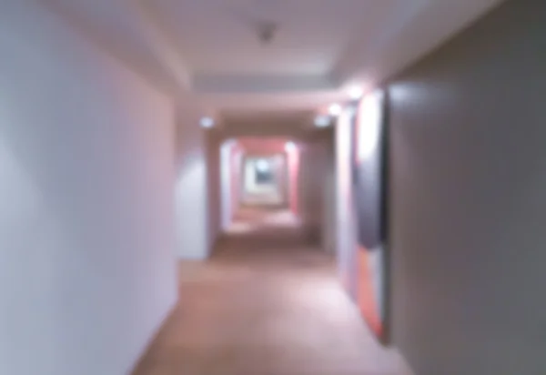 Αφηρημένο θαμπάδα μακρύ διάδρομο από δωμάτιο ξενοδοχείου . — Φωτογραφία Αρχείου