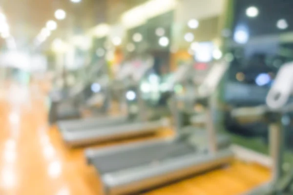 Abstract blur Fitness center with traineger equipments . — Stock Photo, Image