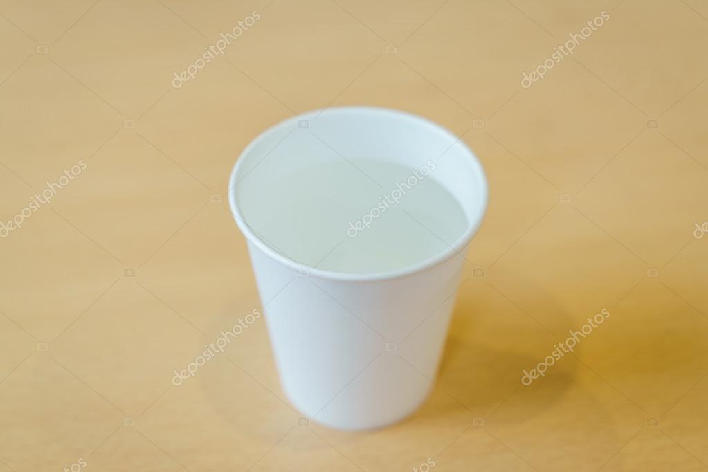 Water in paper cups — Stock Photo © jannystockphoto 124397080