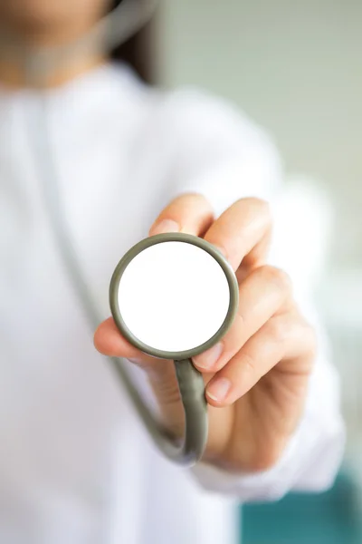 Doctor with stethoscope in the hands — Stock Photo, Image