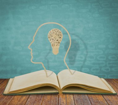kitap ve ampul gra çizim ile bir kafanın içinde kağıt kesme