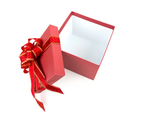 Červená dárková krabička s červenou a glod mašlí na bílém pozadí — Stock fotografie