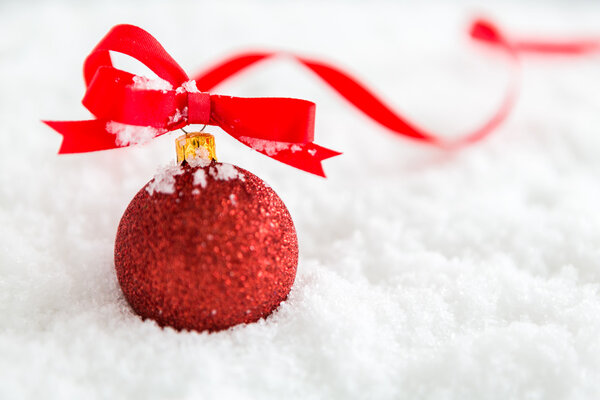 Red christmas balls with snow
