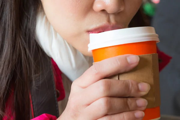 Woman drinking hot coffee — Stock Photo, Image