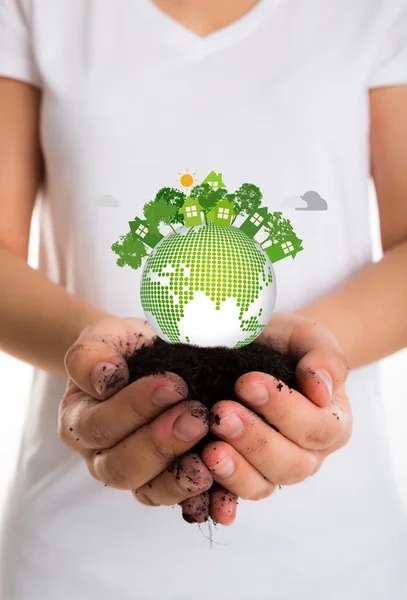 Eco friendly earth in female hands — Stock Photo, Image