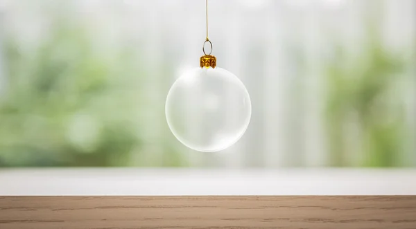 Transparente Weihnachtskugel über Holztisch — Stockfoto