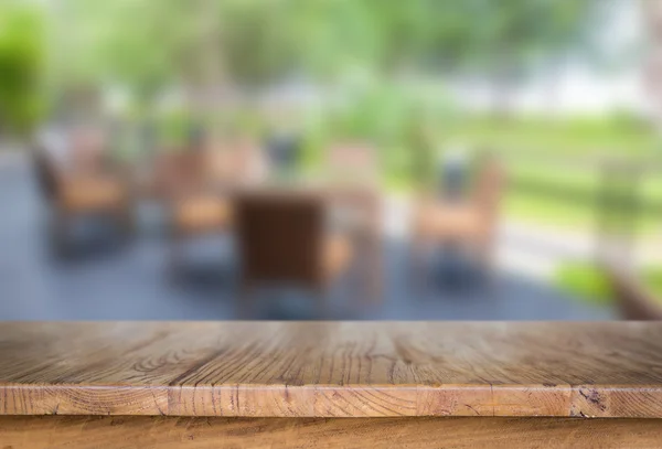 Wood table at restaurant — Stock Photo, Image