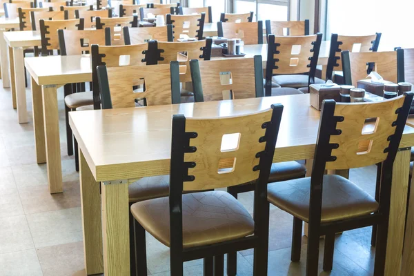 Restaurant interior with wooden table and chair — Stock Photo, Image