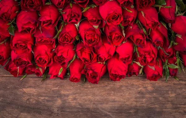 Rose on wooden background — Stock Photo, Image