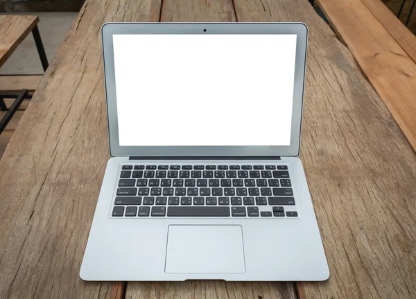 Blank screen laptop computer on wood table — Stock Photo, Image