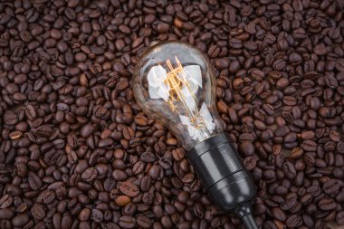 Light bulb on  coffee beans clipart