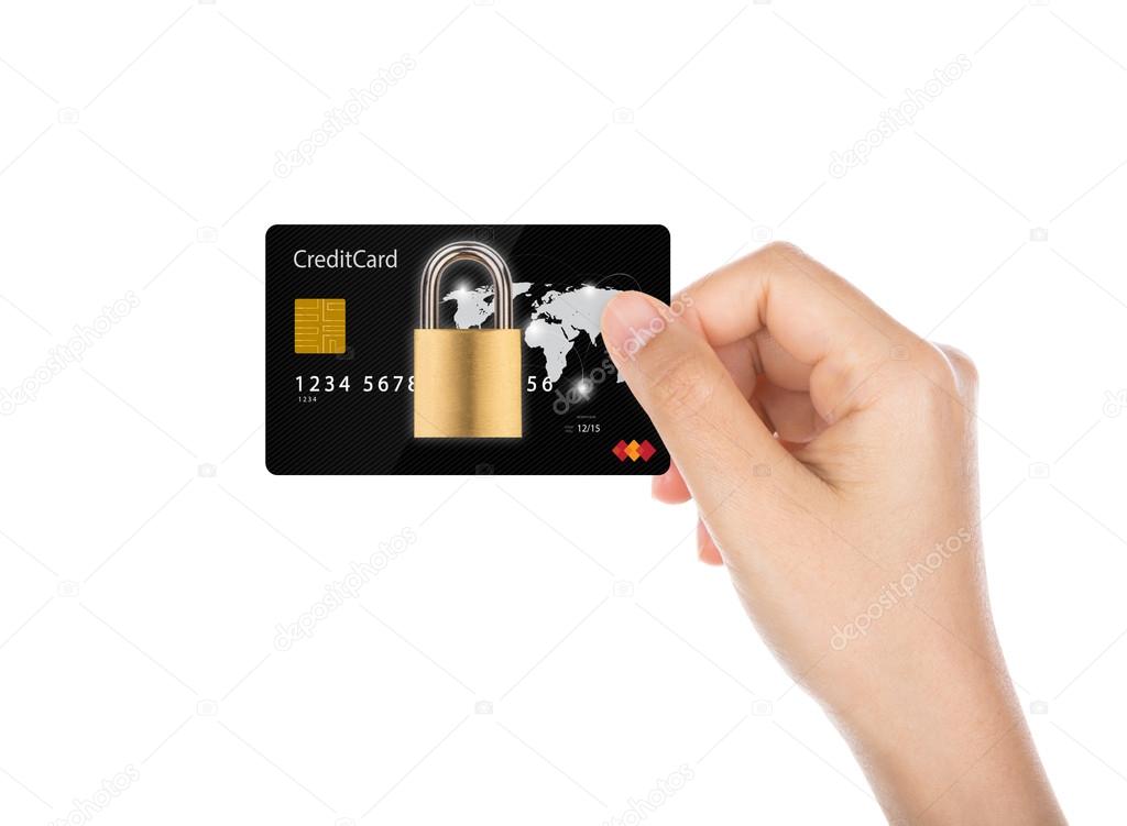 Business security concept : Women hand holding credit card with 