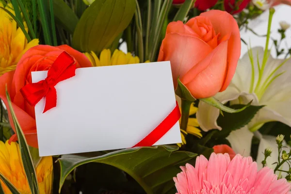 Colorful Bunch of flowers with card — Stock Photo, Image