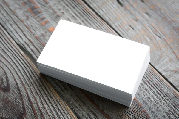 Business cards on wood table ( with separate layer clipping path