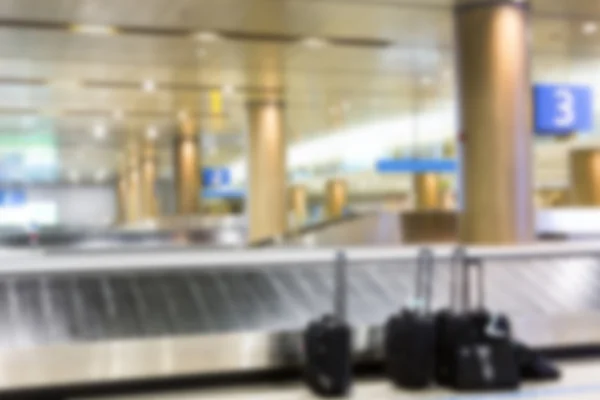 Abstract blur Suitcases and  luggage band on the airport — Stock Photo, Image