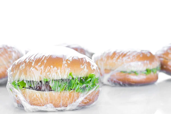 Wrapping Hamburger on white background — Stock Photo, Image