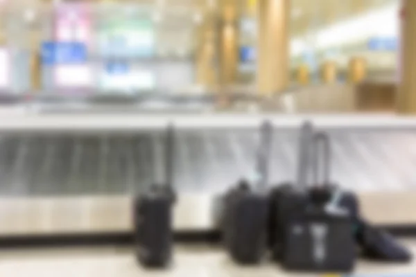 Abstract blur Suitcases and  luggage band on the airport — Stock Photo, Image