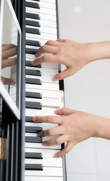Close up of woman hands  playing piano — Stock Photo, Image