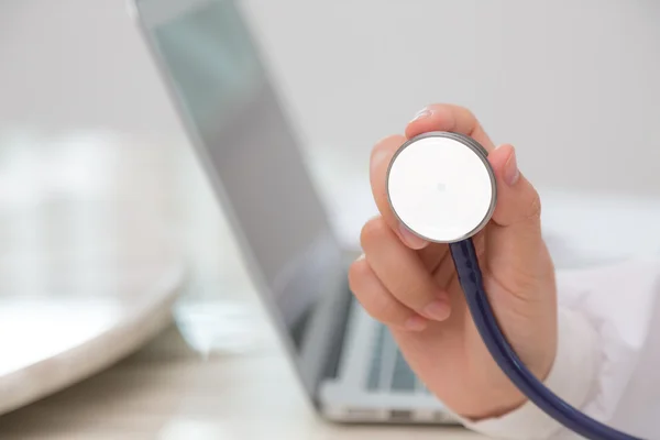 Doctor with stethoscope in the hands — Stock Photo, Image