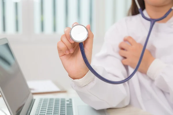 Doctor with stethoscope in the hands — Stock Photo, Image