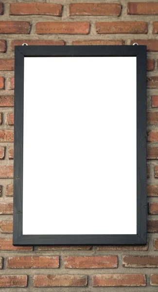 Houten frame op een bakstenen muur — Stockfoto